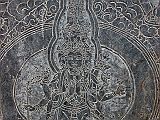 Manaslu 05 12 Ghap Mani Carving Avalokiteshvara with 8 Arms and 11 Heads The mani wall in Ghap has particularly elegant carvings, one of which is the Avalokiteshvara with eight arms and eleven heads. His two central hands holds the jewel of enlightenment.